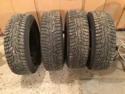 4 Directional Hankook Winter tires. 215-70R-15 on steel rims six hole pattern, and balanced. About 7...