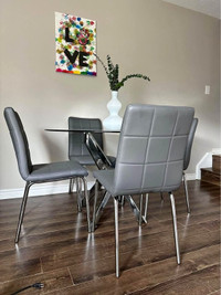 Brand New 4 Seater Glass dinning Table With 4 Lather chairs
