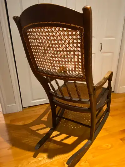 Vintage Rocking Chair. Cain and Wood Construction. Good condition.