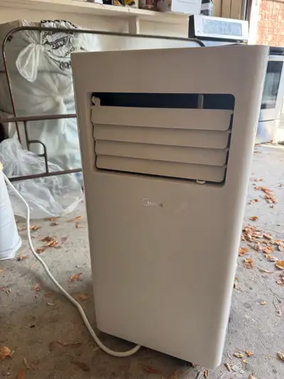 Midea - Portable Air Conditioner Slightly used. All description on Pic-3. Very reasonable pricing. H...