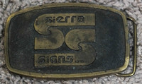 SIERRA SIGNS LTD. BELT BUCKLE.