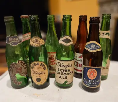 Eight Vintage Beer Bottles For Sale has a lot, View more