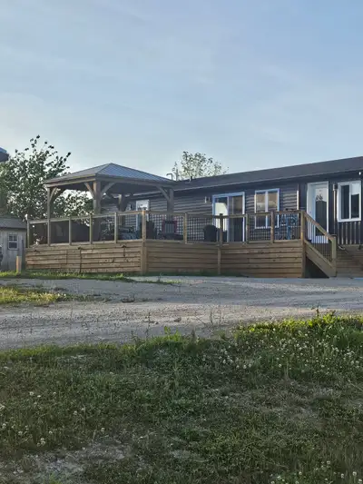 4 season home 12 month living . New park .city water and sewer. Unit is 2 years now old . Cheap livi...