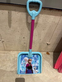 Frozen snow shovel