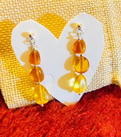 Brand new real Amber sterling silver metal length is around 2 inches Pick up location is possible fr...