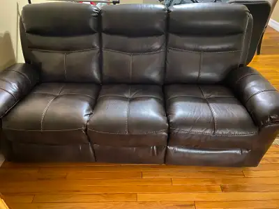original price on leon's 1299, well maintained looking like new Cooper Leather Reclining Sofa - Brow...