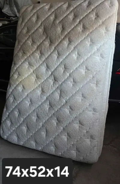 Free pillow top mattress. It's old but comfortable with some stains.