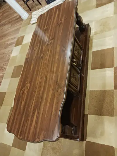 - Hard wood coffee table for sale - 55 inches long - 22 inches wide - Solid wood - Heavy with a cabi...