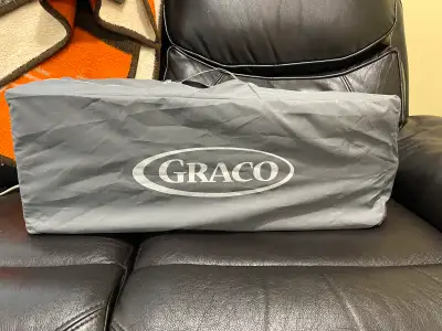 Graco crib on wheels. 40” x 28” x 30”. Collapses into a convenient carrying bag. Never used. Brand n...