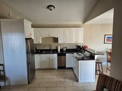 Welcome to this fully-furnished 2-bedroom, 2-bathroom condo located in the sought-after Gables of PE...