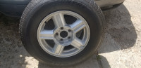 Set of 4 215/75R15 M+S on Ford Escape alloy rims $600