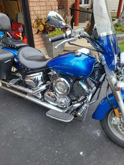 2002 yamaha vstar classic 1100 cc Good running bike Lots of custom add ons Cobra pipes Hard saddle b...