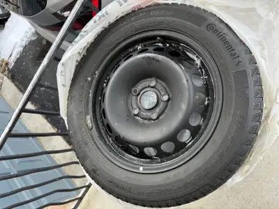 Set of 4 Continental Wintercontact with steel rims in good condition 205/55 R16 94H Used on VW golf...