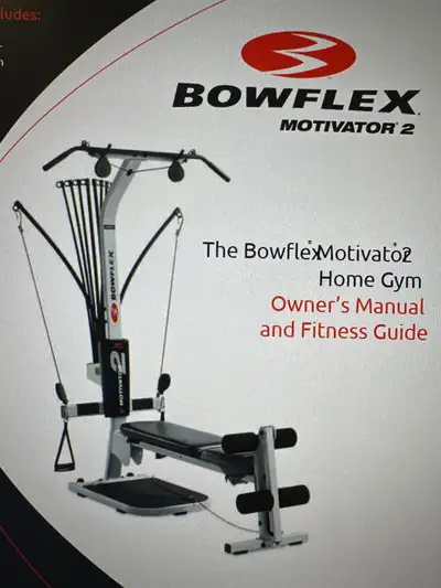 Home gym with leg extension and rowing belt