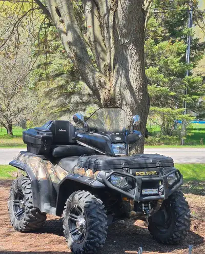 2014 browning addition polaris sportsman 850cc XP, EFI, EPS in mint condition. No cracks in plastic...