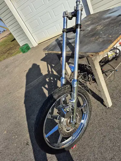 Harley davidson front end with 21in custom wheel and caliper. Call 9058706600. NOTE. This is used. I...