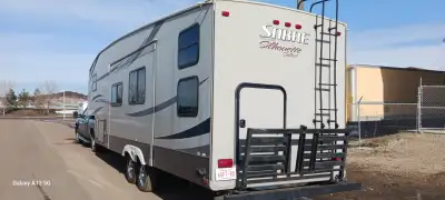 I Will Consider Offers This is a Brand NEW 5th wheel unit. Bought with the intention of going campin...