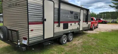 2019 grey wolf sleeps up to 8 electric fireplace and propane furnace . AC works goods . electric awn...