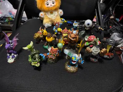 Dive into nostalgia with this vibrant assortment of Skylanders figures! Perfect for collectors or ki...