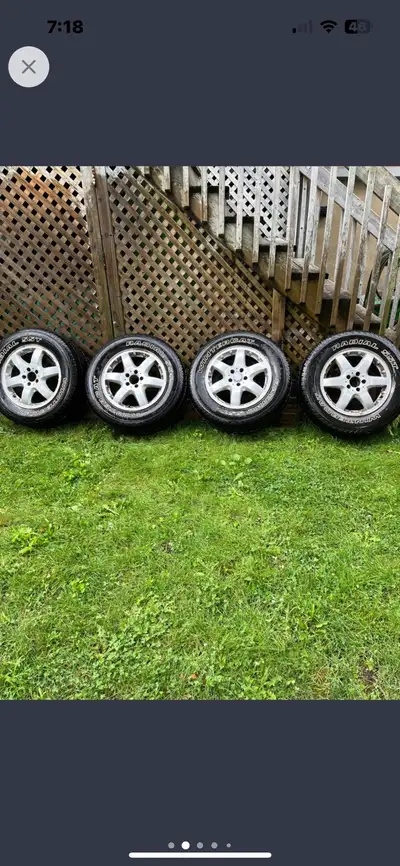 Good condition silver Mercedes rims with Wintercat 275/60/17 tires. $250 for all 4 rims- tires free...