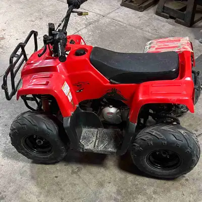 I'm selling a red Kids ATV, perfect for young adventurers! This ATV has seen some action and is in u...