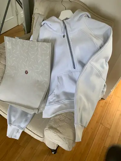 ⭐️Brand new tags on lululemon 1/2 zip LAVENDER hoodie⭐️ Kangaroo pocket with hidden phone sleeve Zip...