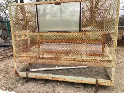 Forklift safety mancage for sale. 85’ long, 49’ wide front mast is 65’ high. Fork pockets have chain...