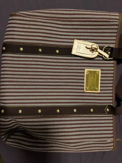 Older style Louis Vuitton Bag. Gently used condition.