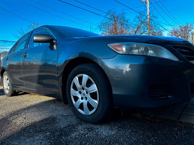 2010 Toyota Camry with extra 4 winter tire with rim in Cars & Trucks in City of Toronto