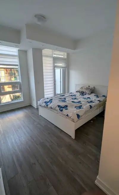 Master bedroom with private ensuite bathroom in condo townhouse