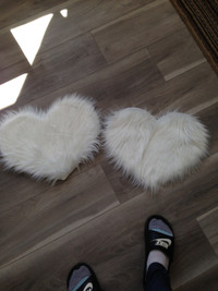2 brand new small heart shaped rugs $5 each