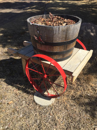 Wooden 1/2 barrel on a cart