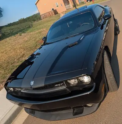 2010 Challenger SRT 8 ADDED: Deck update, ceramic coating, new windshield, back up camera Located in...