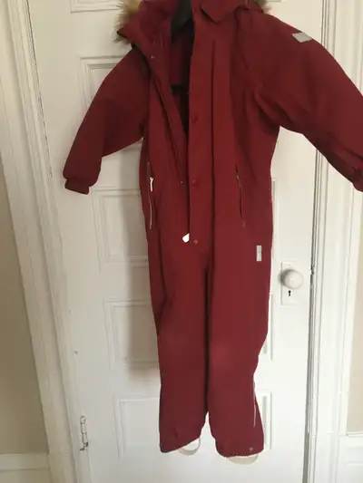 Kids size 98 red snowsuit by Reima. very easy for kids to get in and out for fast readiment at milit...