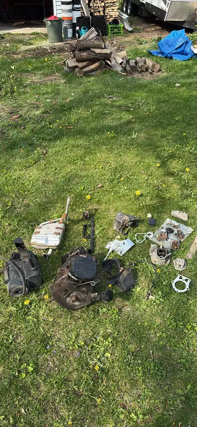 Engine and parts off a golf cart