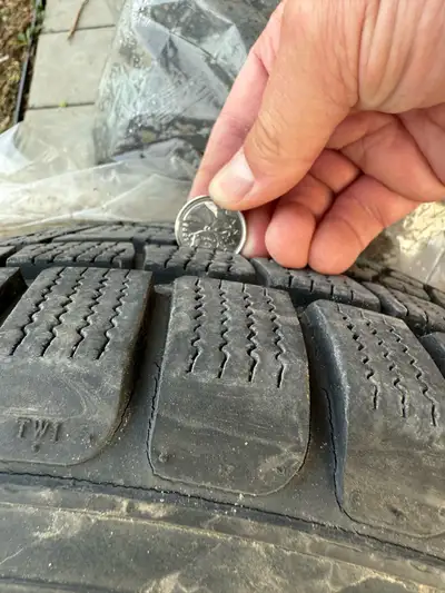 4 winter tires on steel rims from a 2013 Toyota Corolla. As seen in the pictures, some rust on rims,...