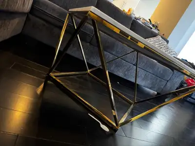 coffee table with marble top and golden vase, View more