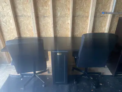 This custom-built computer desk offers a spacious and functional workspace, perfect for home or offi...