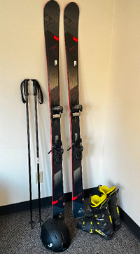 Fischer skis, Salomon boots, poles and helmet