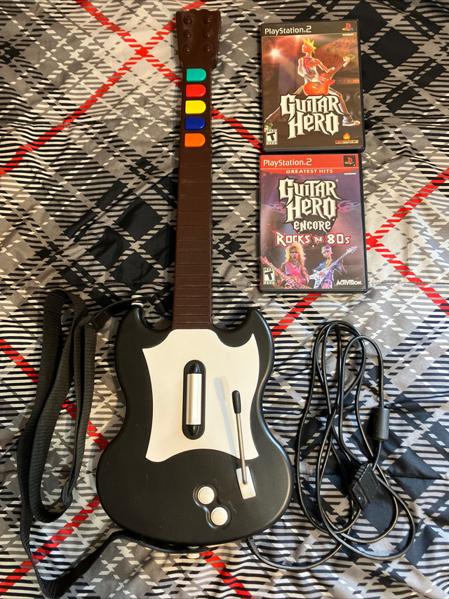 Guitar Hero 1 & Encore Rocks The 80’s PS2 W/ Guitar Controller in Older Generation in City of Toronto