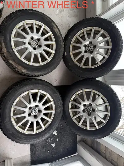 OEM Volkswagen Rims with snow tires Bolt pattern 5x100 195/65/15 Dot # 0618 Ready to be mounted and...