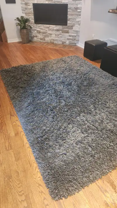 Deep pile rug. Smoke free, pet free home - just changing the decor. Size is 5'7"x7'10". It was under...
