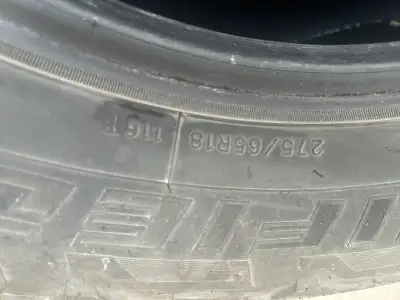 Ridgetrek 275/65r18 tires. Had a couple nail holes but were professionally fixed. These tires have o...