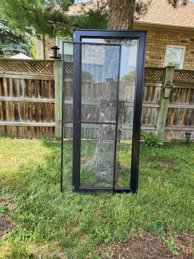 Black door 32"x 80" . Storm / Screen Windows, Doors & Trim