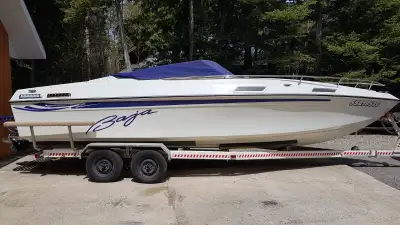 1986 Baja Force 250 - runs well and a definite eye catcher on the water 25’ long excluding the swim...