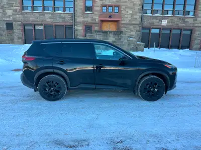 2023 Nissan Rogue SV Midnight Addition ￼AWD. One owner CARFAX CLEAN & HARDLY DRIVEN on a short-term...