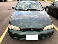 parting out the 2000 Toyota Corolla LE for PARTS!! Green in colo