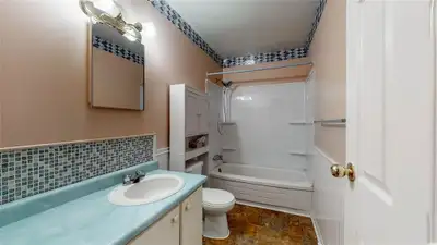 Nice home in decent neighborhood, with 4 bedrooms, large living room, bath/kitchen/dining room, plus...
