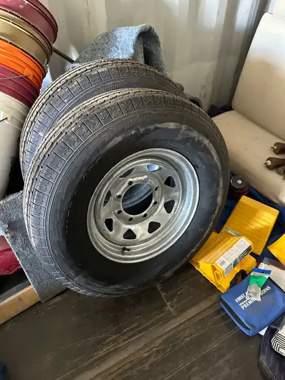 235/80R16- 16” spare trailer tire on aluminum rim, View more