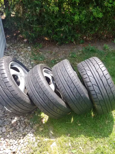 Set of original 2000 Boxster wheels and tires, rears are good, fronts are not, all are driveable, re...